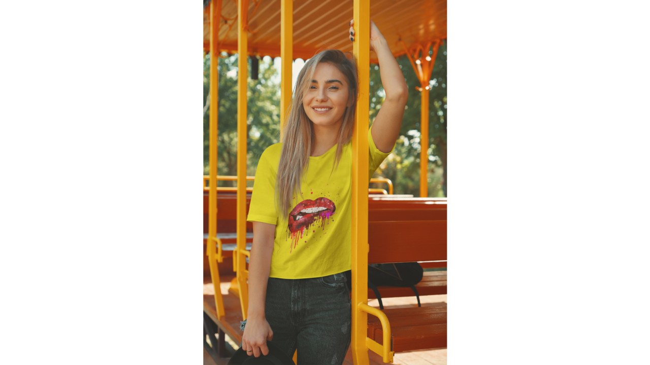 t-shirt-mockup-featuring-a-smiling-woman-posing-on-a-colorful-ride-m4432-r-el2-4-1-1_16x9